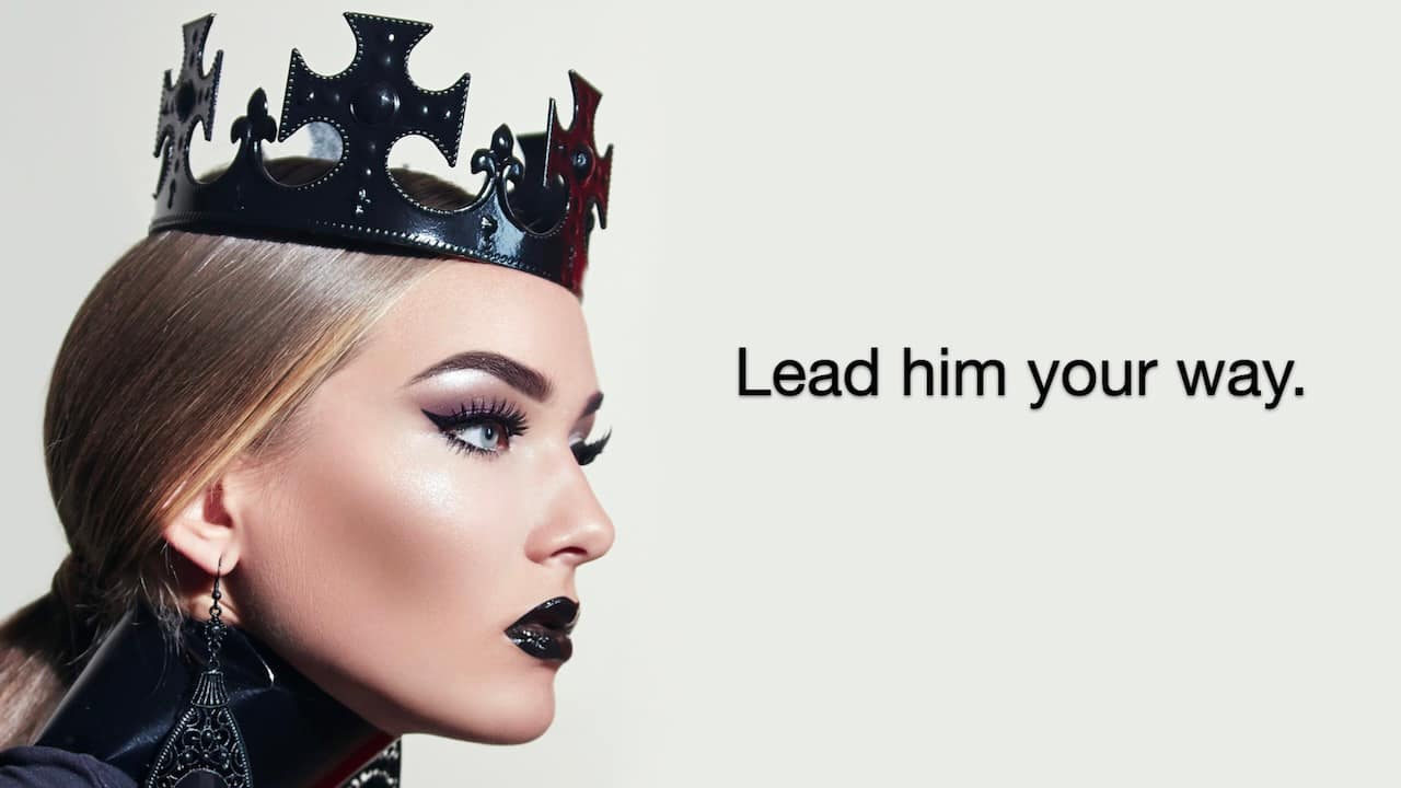 A dominant woman wearing a black crown symbolizes confidence and control in a Female Led Relationship (FLR).