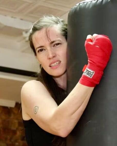 Mistress Veronica, Dominatrix in New York, training with red boxing wraps