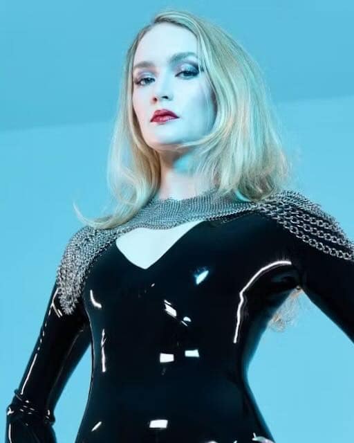 Mistress Rozz, Dominatrix in Los Angeles and New York, wearing a black latex outfit