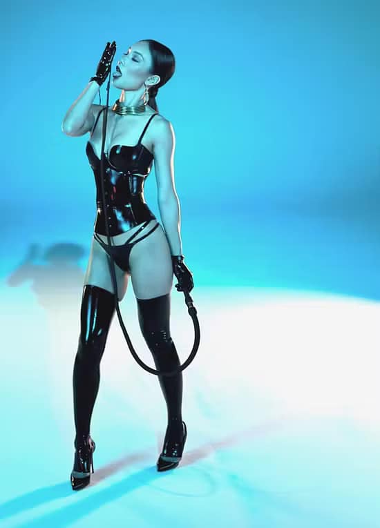 Dominatrix Mistress Gemma Li, Denver, USA, Domina with a whip.