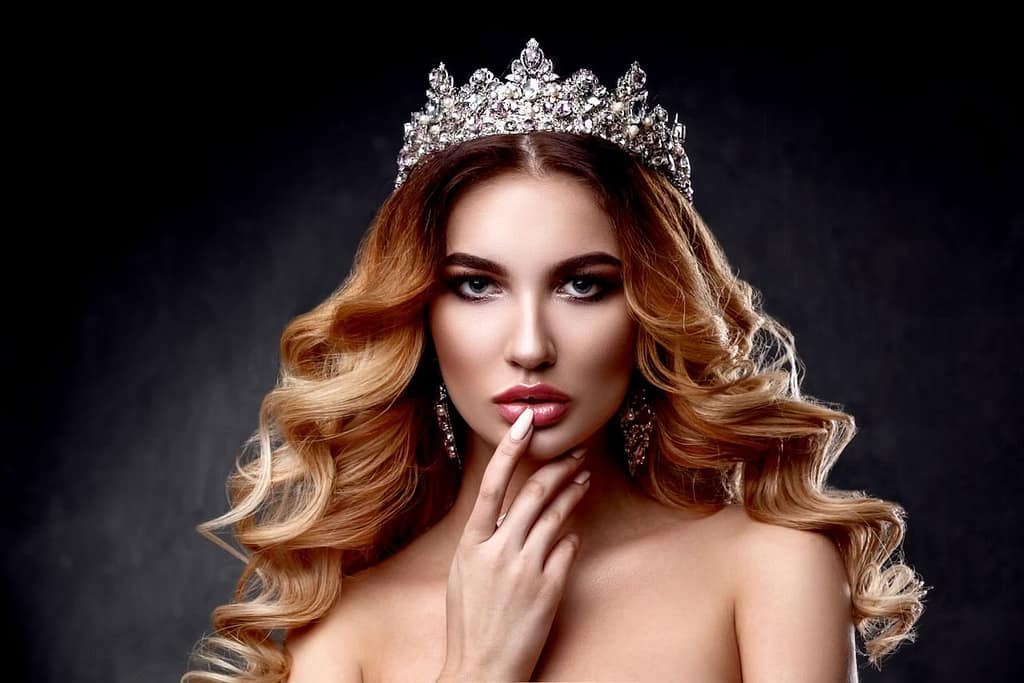 Confident woman in an elegant setting representing a Female Led Relationship, symbolizing trust, respect, and feminine authority.