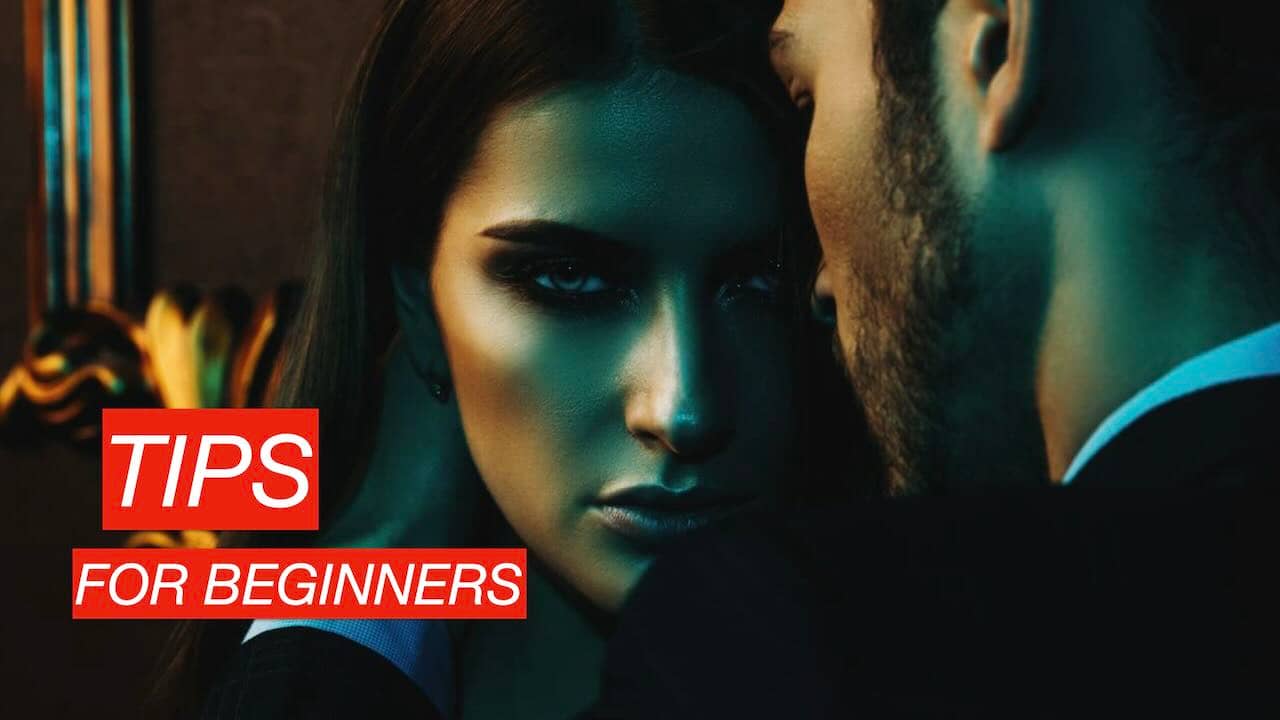 BDSM tips for beginners: elegant, mysterious couple in close-up.