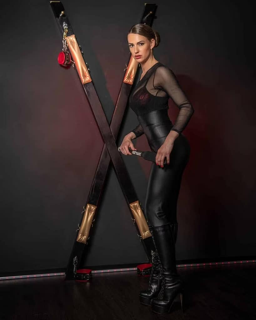 German Dominatrix Frau Ansehnlich in her Dungeon.